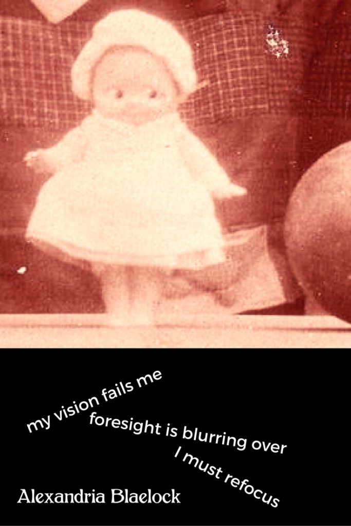 Small doll on a pillar with the haiku; My vision fails me, foresight is blurring over, I must refocus